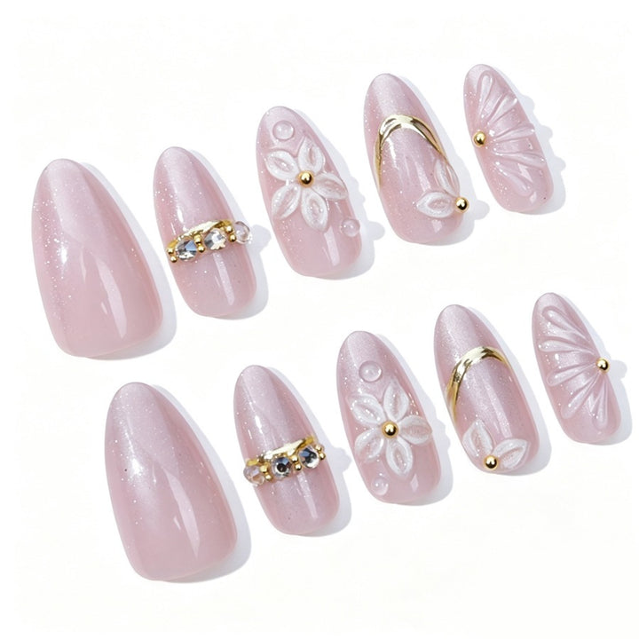 Elegantes Kunstnagelset mit Blumen- und Glitzerelementen Karnz