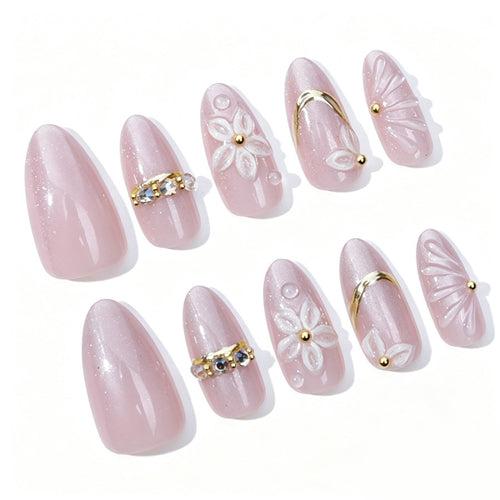 Elegantes Kunstnagelset mit Blumen- und Glitzerelementen Karnz