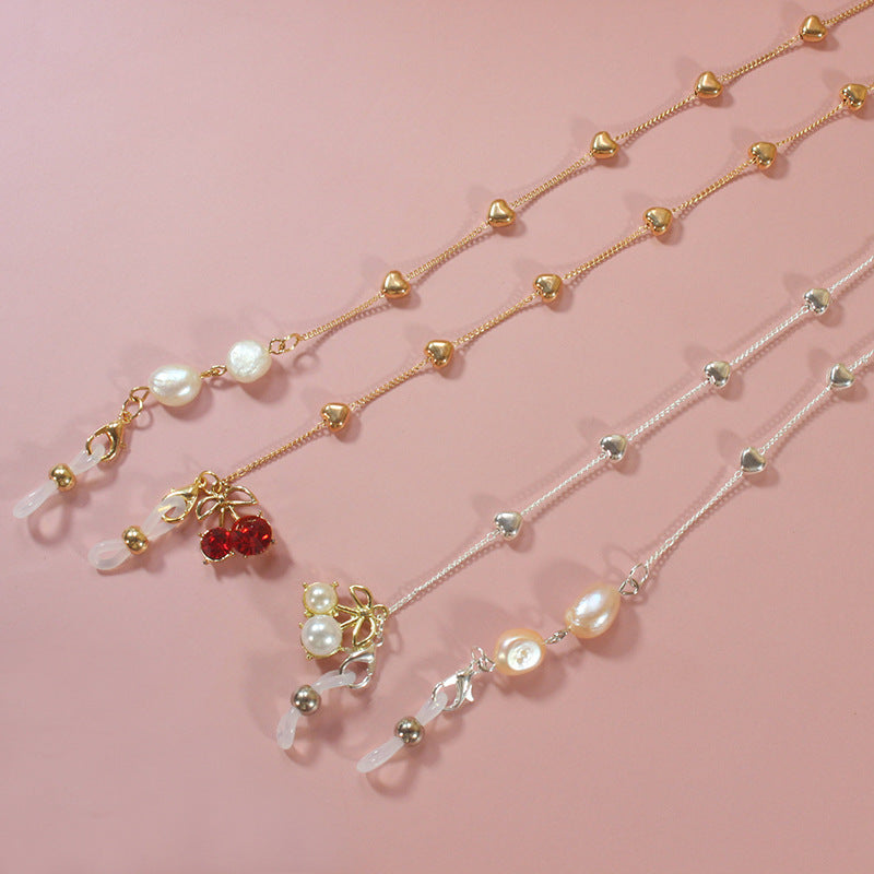 Elegantes Schmuckband mit Perlen und Silbernen Akzenten Karnz
