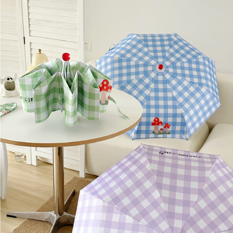 Damen Regenschirm mit verspieltem Pilzdesign von Karnz