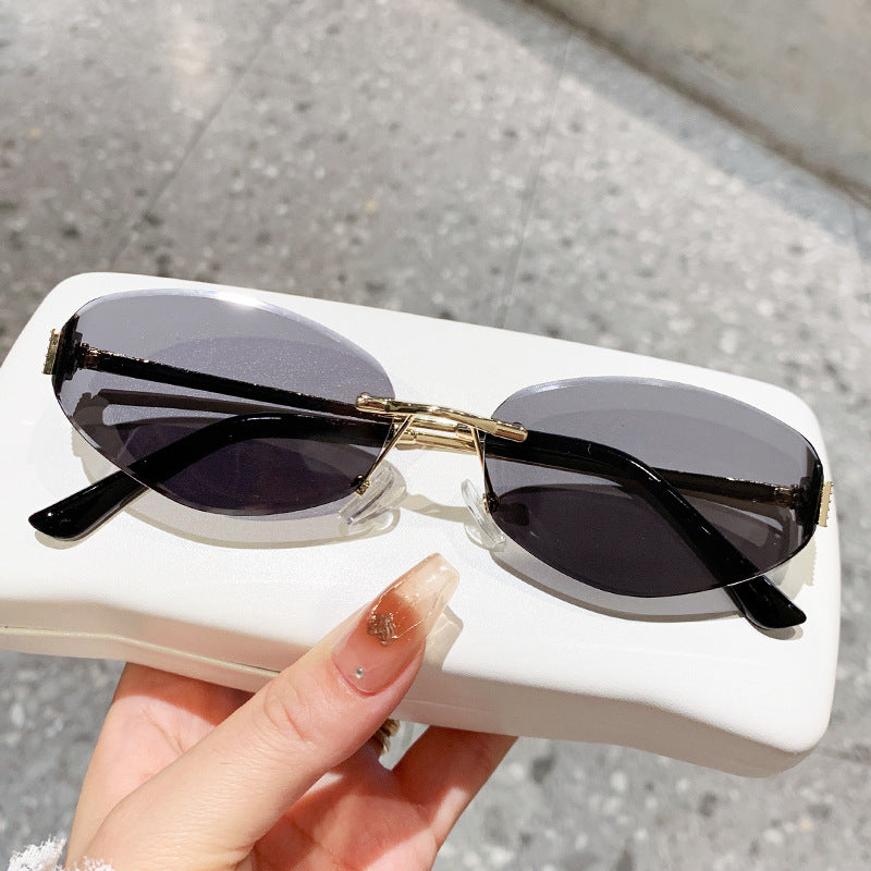 Damen Sonnenbrille im modernen Ovaldesign mit kontrastierendem Rahmen Karnz