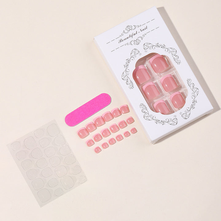 Fußnagelkunstset mit elegantem French-Design und Glitzerakzenten Karnz