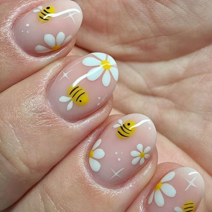 Kunstnagelset mit verspieltem Bienen- und Blumenmotiv Karnz
