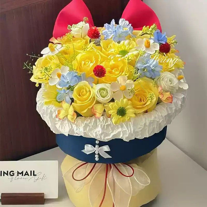 Künstliches Blumenarrangement mit Schleifenakzent