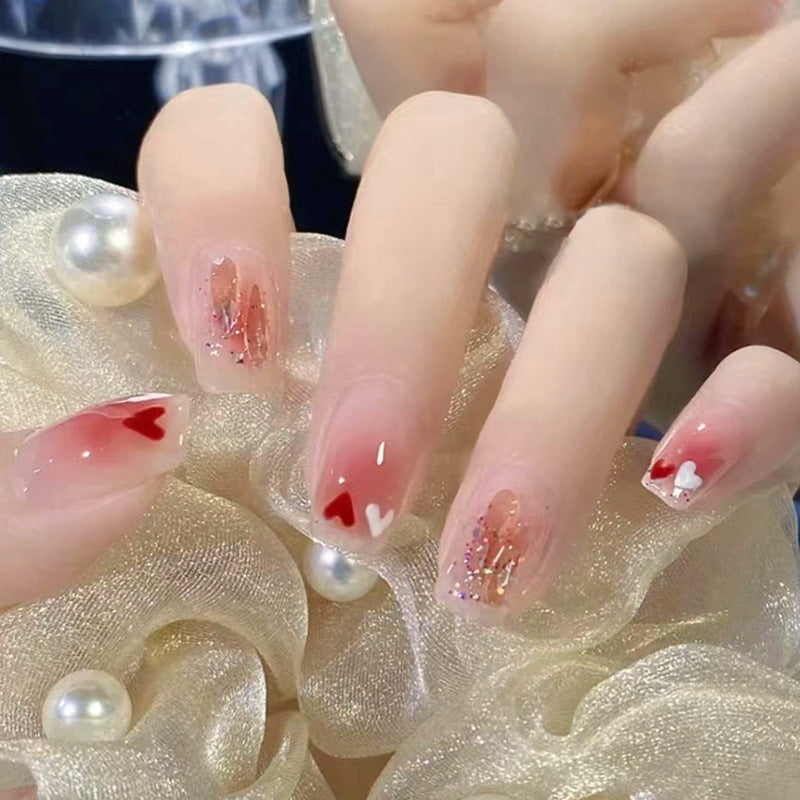 Kunstnagelset mit funkelnden Glitzer- und holografischen Akzenten Karnz