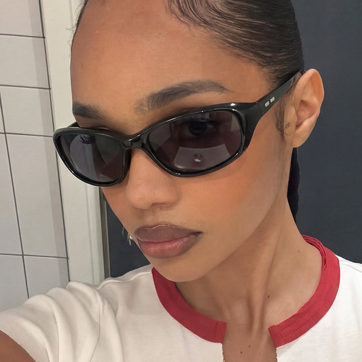 Damen sportliche Sonnenbrille mit breitem, ergonomischem Rahmen Karnz