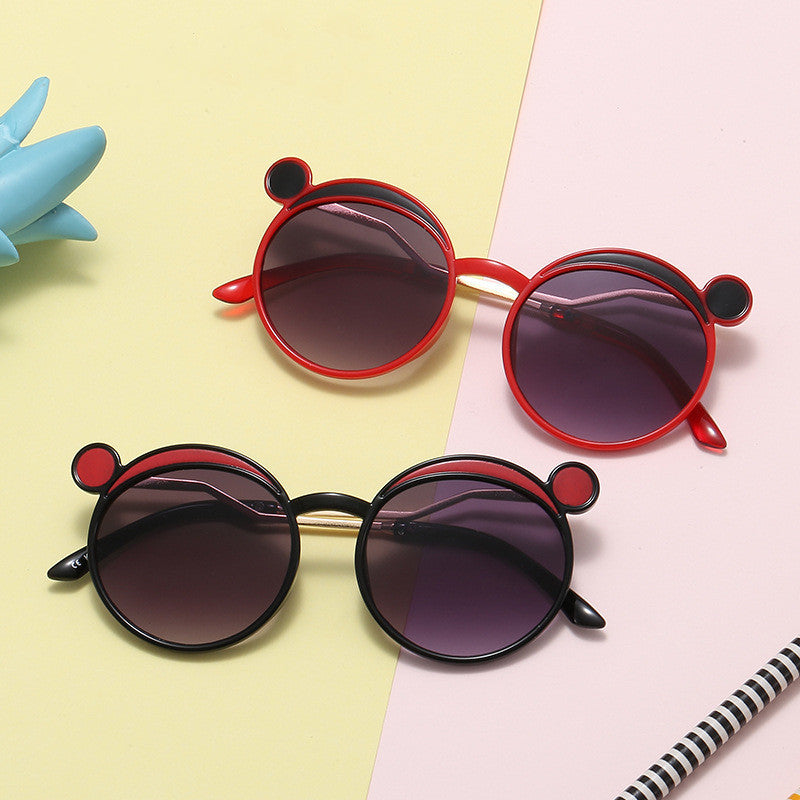 Damen Fashion-Runde Sonnenbrille mit innovativem Rahmen und farbigen Gläsern Karnz