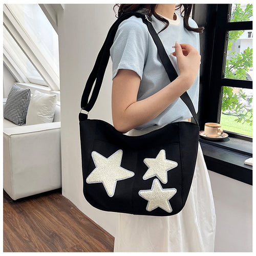 Lässige mit Sternen verzierte Schultertasche