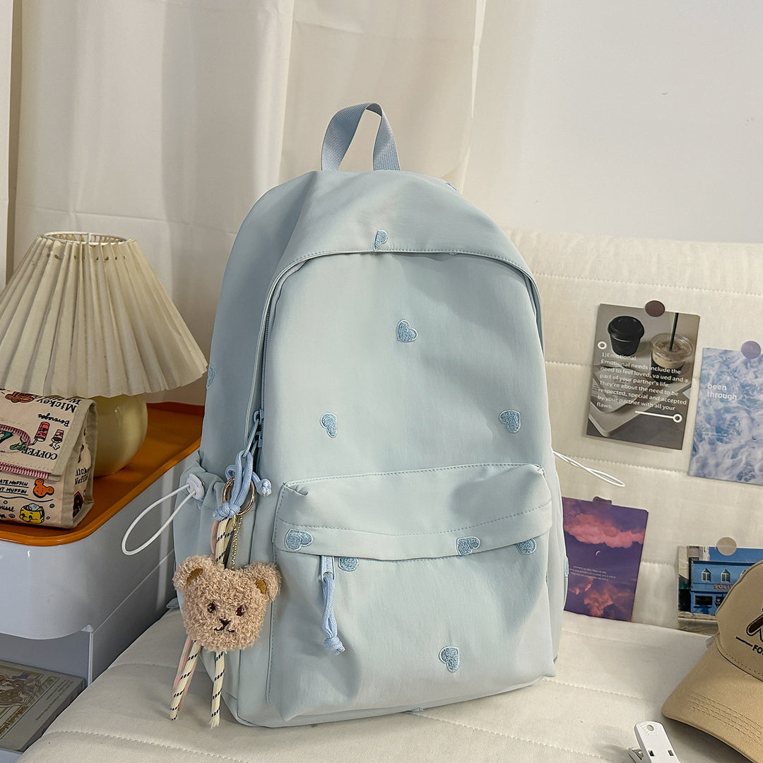 Vielseitiger lässiger Rucksack mit lustigem Charakteranhänger Karnz