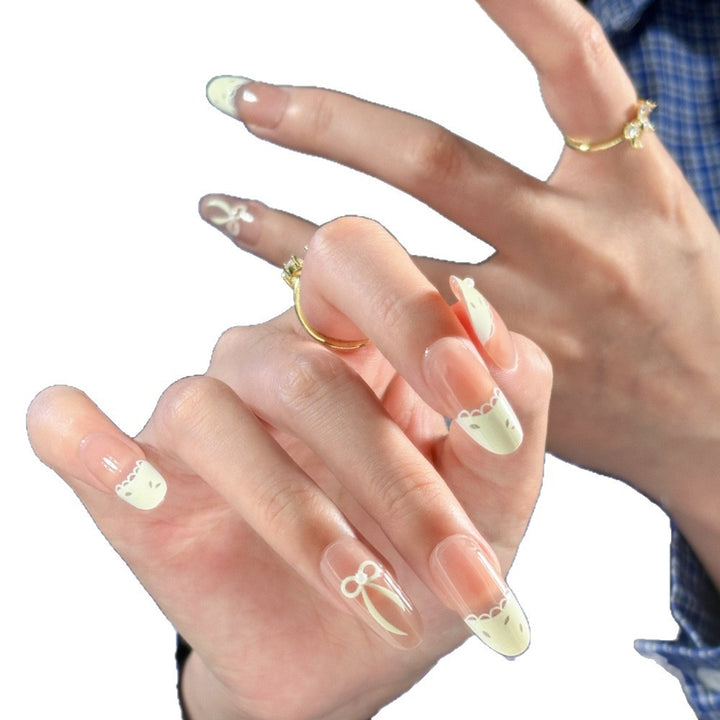 Künstlerisches Press-On-Nagelset mit elegantem Schleifen-Design Karnz