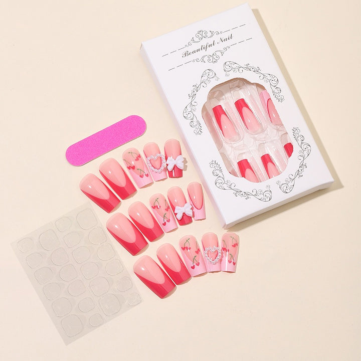 Kunstnagelset mit romantischen Kirschmotiven und eleganten Akzenten Karnz