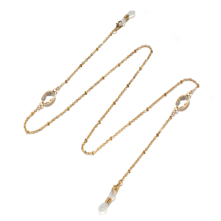 Eleganter mit Edelsteinen verzierter Brillenhalter Karnz
