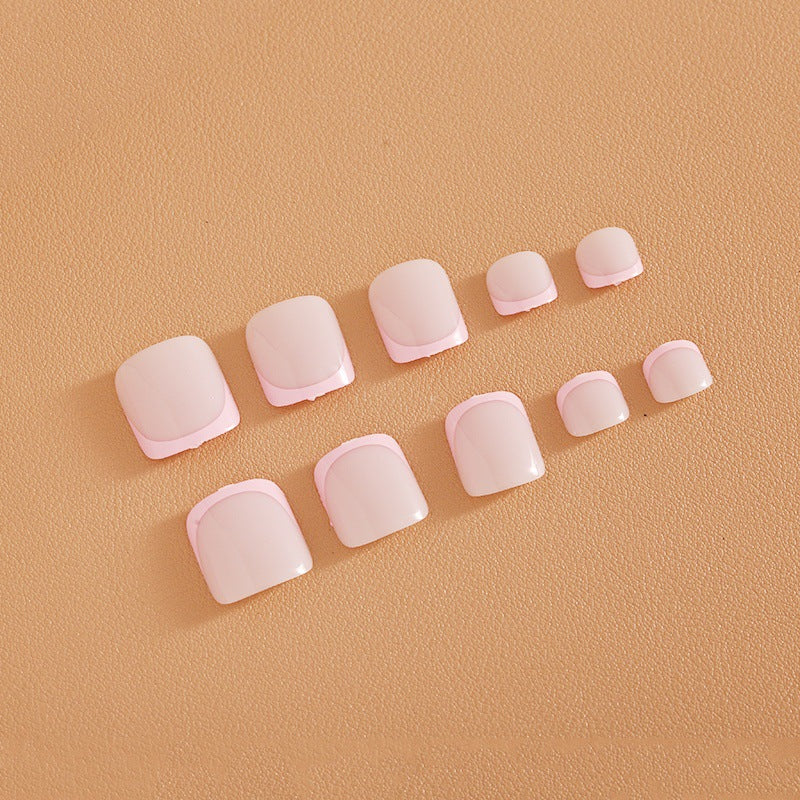 Fußnagelkunstset mit elegantem French Design und Glitzerakzenten Karnz