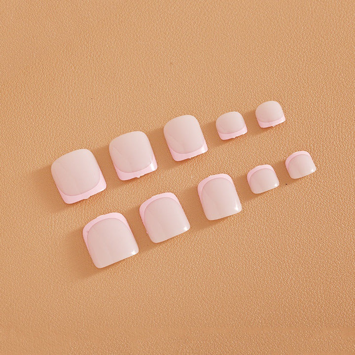 Fußnagelkunstset mit elegantem French Design und Glitzerakzenten Karnz