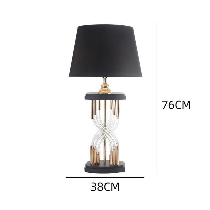 Moderne dekorative Tischlampe mit skulpturaler Basis