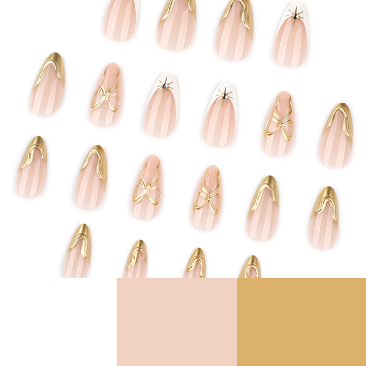 Kunstvolle Stiletto-Nägel mit eleganten Goldakzenten Karnz