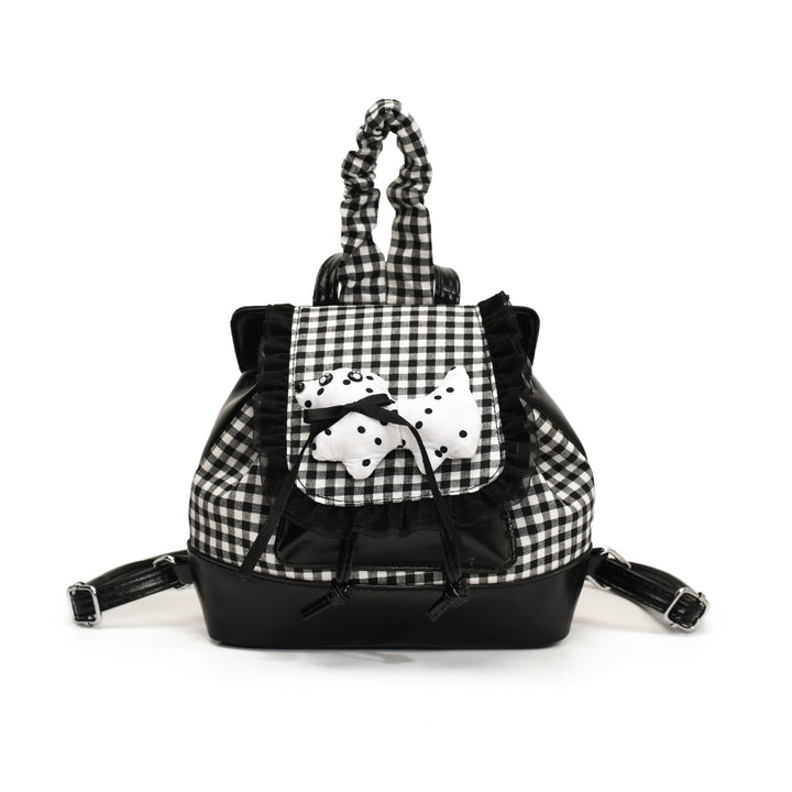 Verspielter Rucksack mit Karomuster und Tierapplikation Karnz