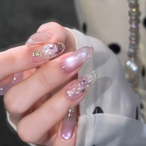 Kunstnägel mit Glamourösem Glitzer- und Blumen-Design Karnz