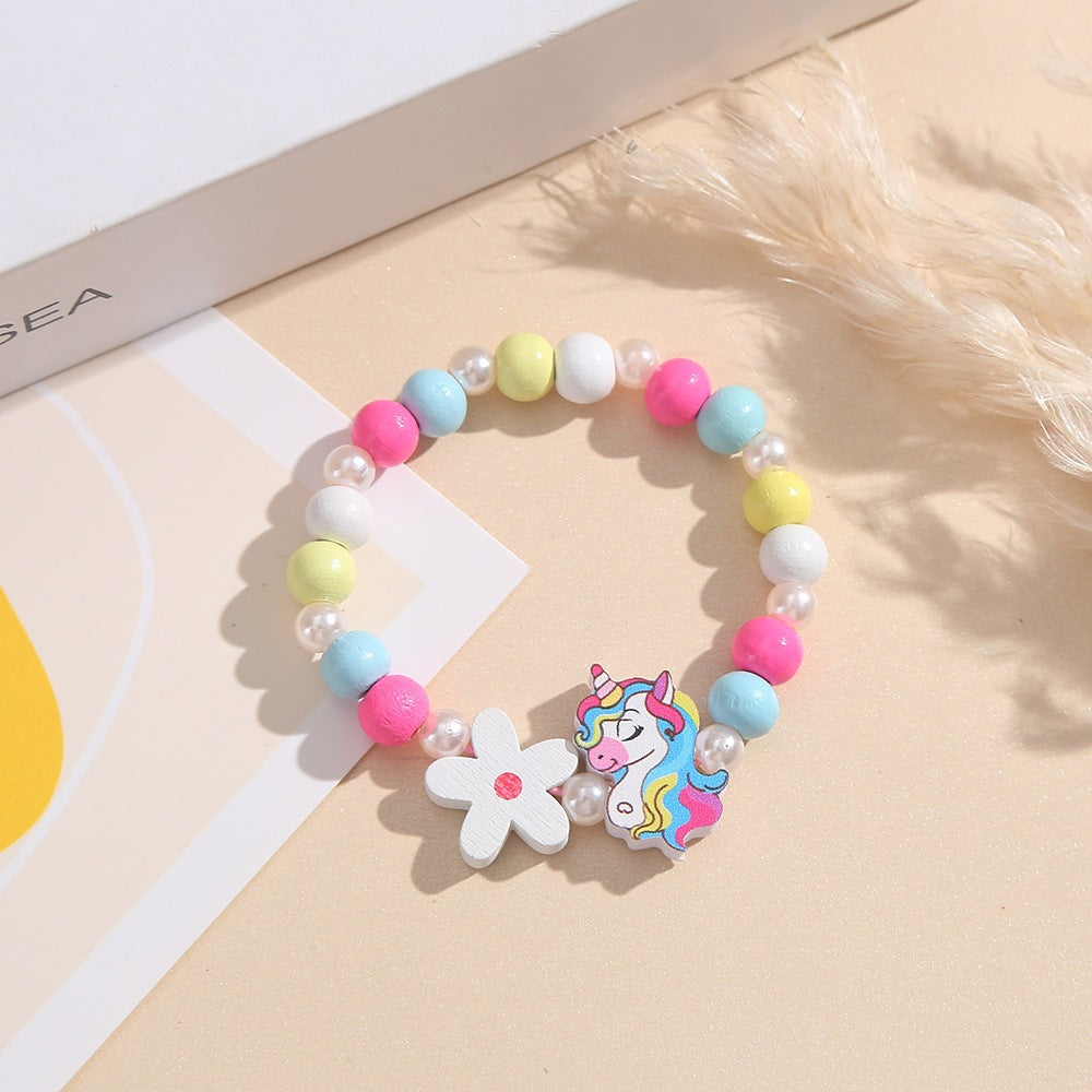 Verspieltes Kinderarmband mit Einhorn- und Blumenmotiv Karnz