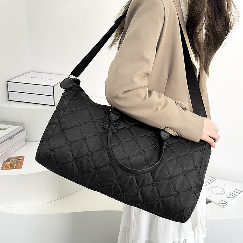 Elegante gesteppte Reisetasche Karnz