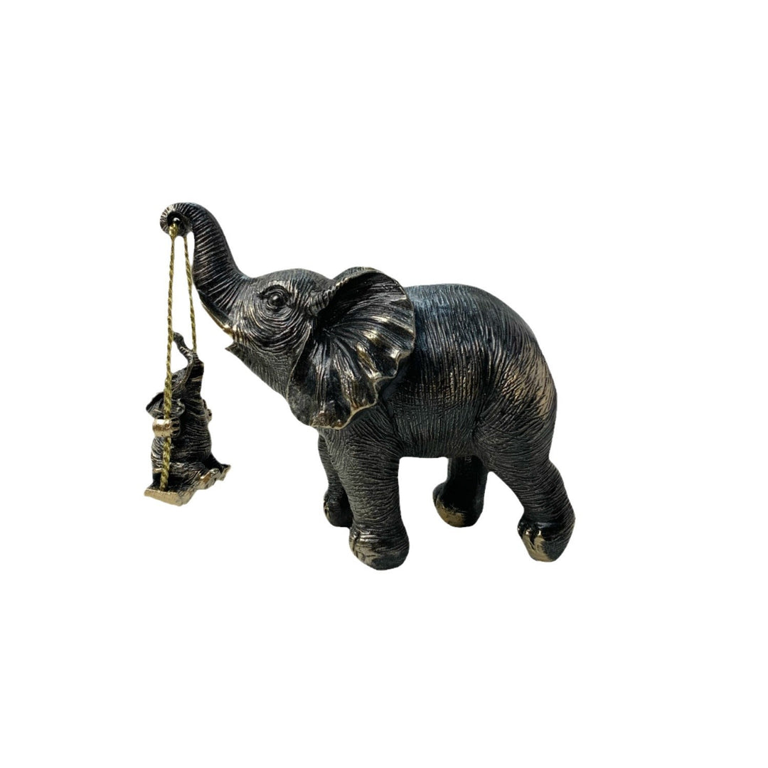 Dekorative Elefantenfigur mit Kind Karnz