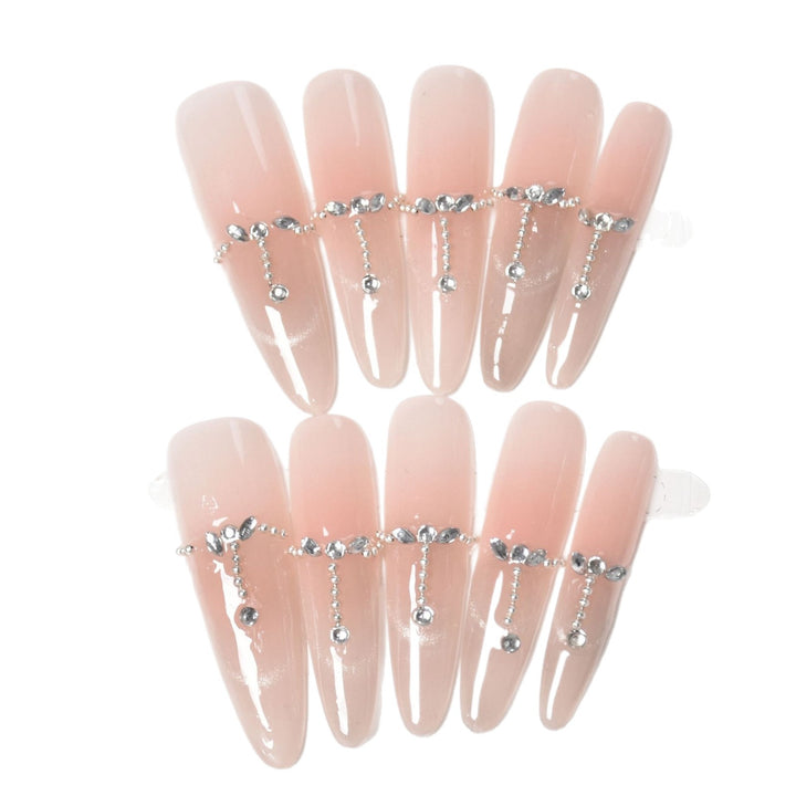 Elegante mit Strass akzentuierte Press-On Nägel Karnz