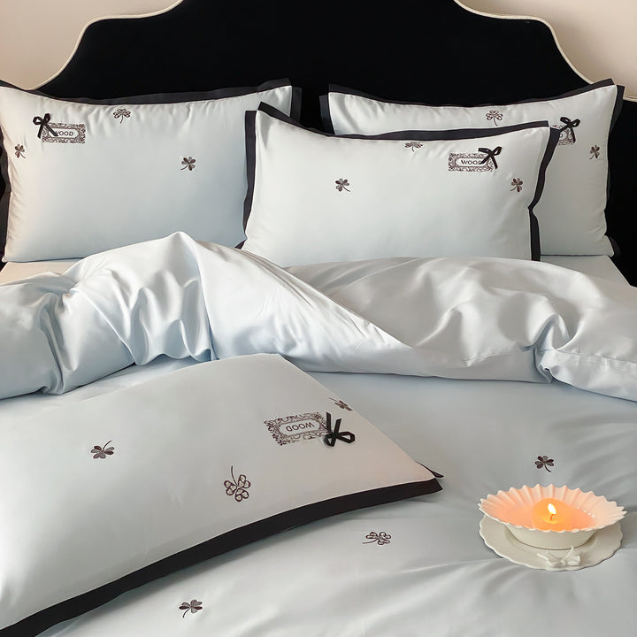 Besticktes Baumwollsatin Bettbezug-Set mit kontrastierendem Paspelrand und Schleifenapplikation