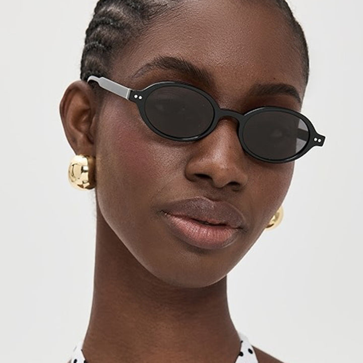 Damen modische ovalförmige Sonnenbrille mit ausgefallenem Rahmen Karnz