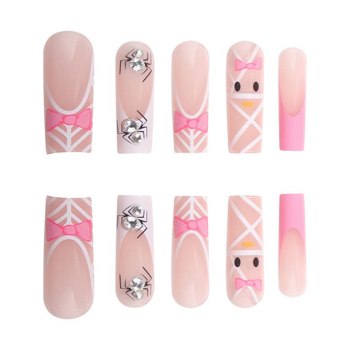 Künstlerische Press-On-Nagelerweiterungen mit Spinnen- und Schleifen-Design Karnz