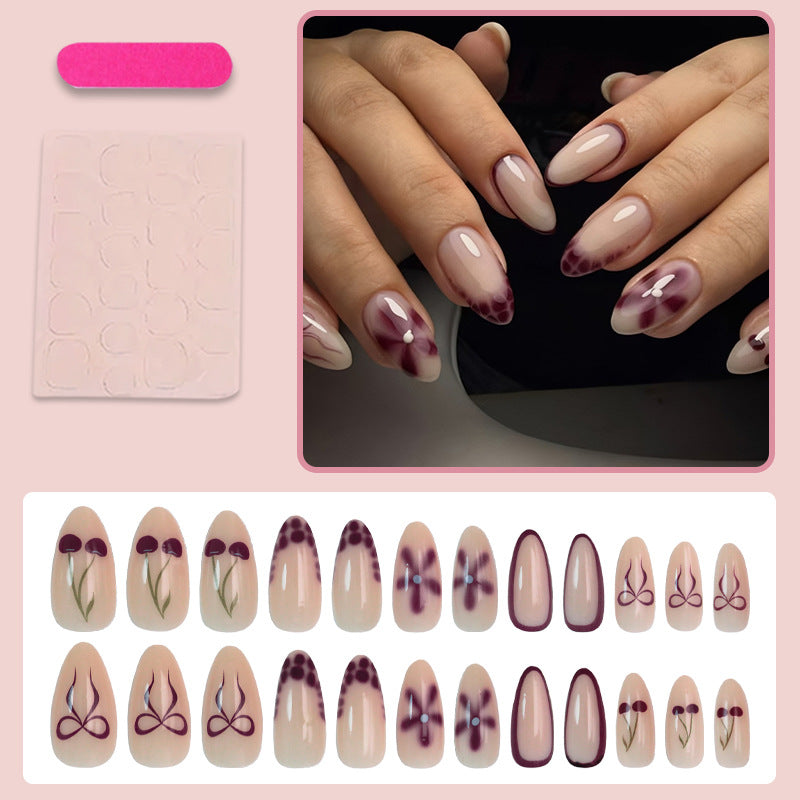 Kunstnagelset mit modernen floral-marmorierten Designs Karnz