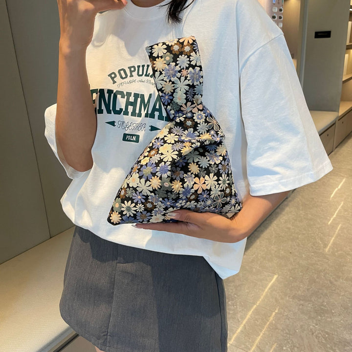 Stilvolle Blumenbedruckte Clutch