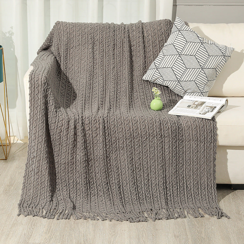 Strukturierte Strickwurfdecke