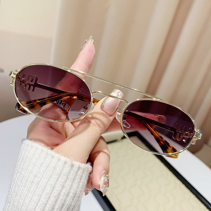 Damen modische Brille mit elegantem Metallrahmen und einzigartigem Design Karnz