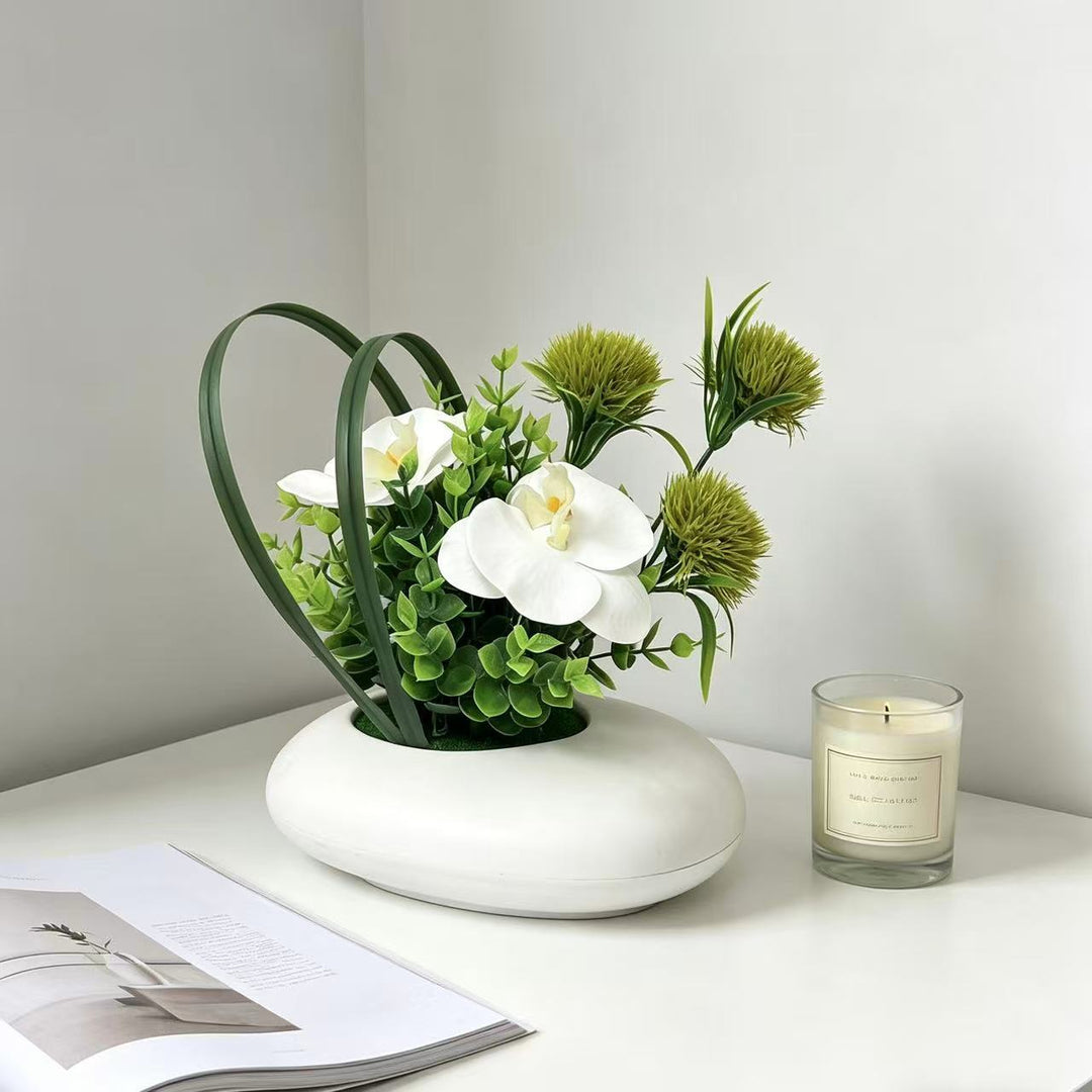 Moderne dekorative künstliche Blumenanordnung