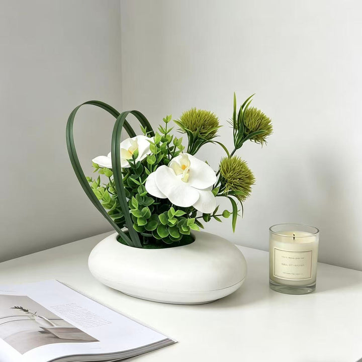 Moderne dekorative künstliche Blumenanordnung