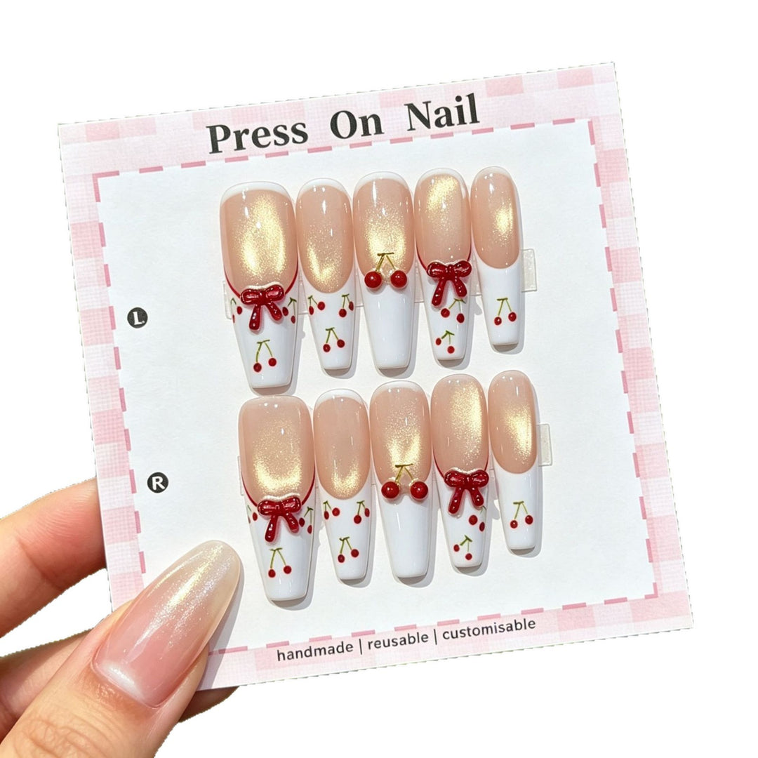 Künstlerisches Press-On Nagelset mit Kirsch- und Schleifenmotiven
