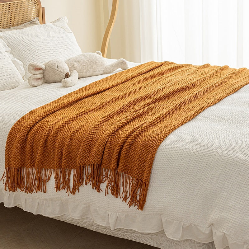 Strukturierte Strickwurfdecke