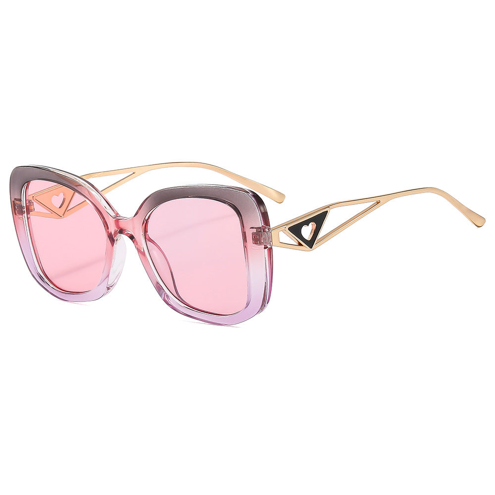 Damen modische oversized Sonnenbrille mit luxuriösem Herzdetail Karnz
