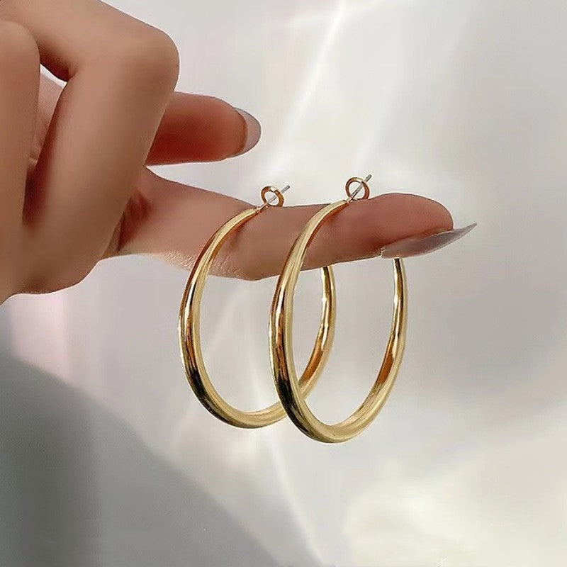 Elegante und Zeitlose Ohrhänger Karnz