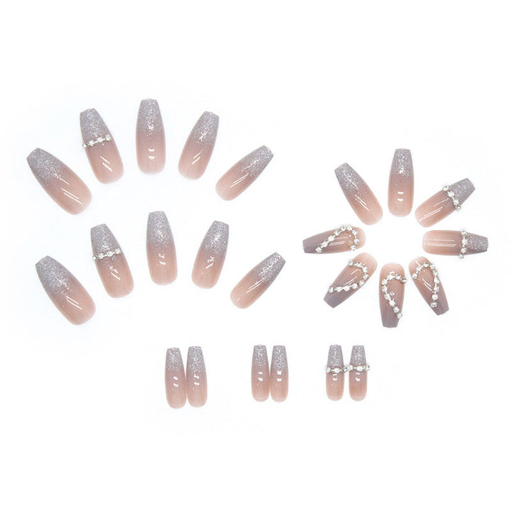 Kunstnagel-Set mit funkelnden Herzmotiven und Glitzerakzenten Karnz