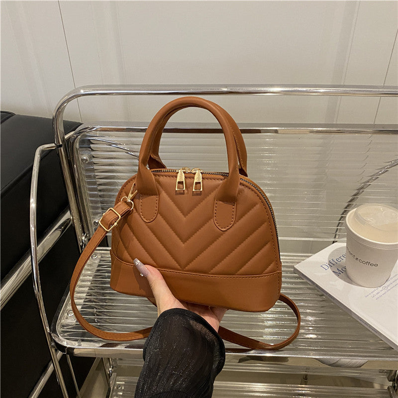 Gepatchte Mini-Handtasche Karnz