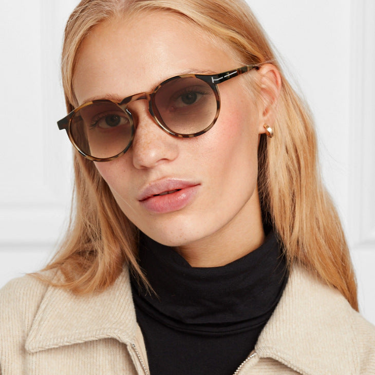 Damen modische runde Sonnenbrille mit elegantem Kunststoffrahmen Karnz