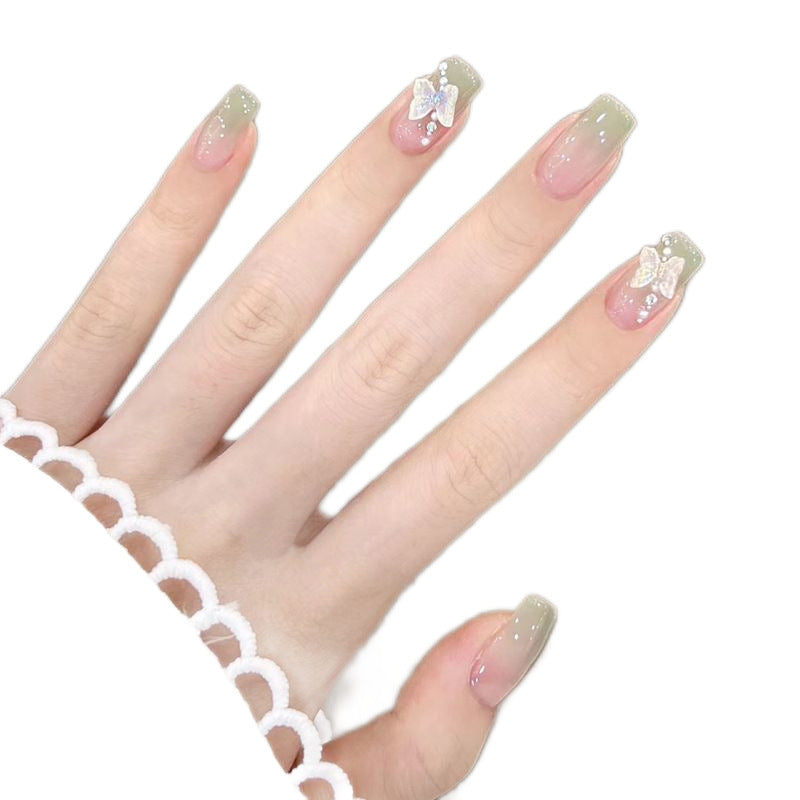Künstliche Kunstfingernägel mit Elegantem Ombre-Design und Schmuckakzenten Karnz