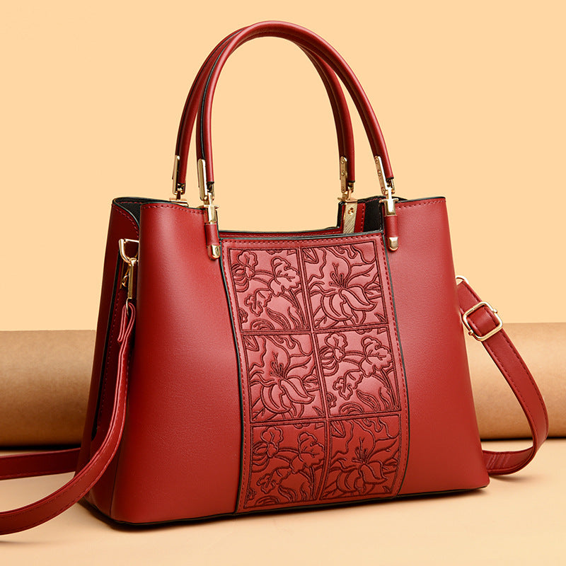 Elegante bestickte Handtasche Karnz