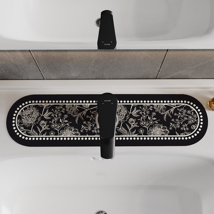 Decorative Oval Silicone Faucet Splash Guard Mat with Floral Engraved Print and Non-Slip Backing