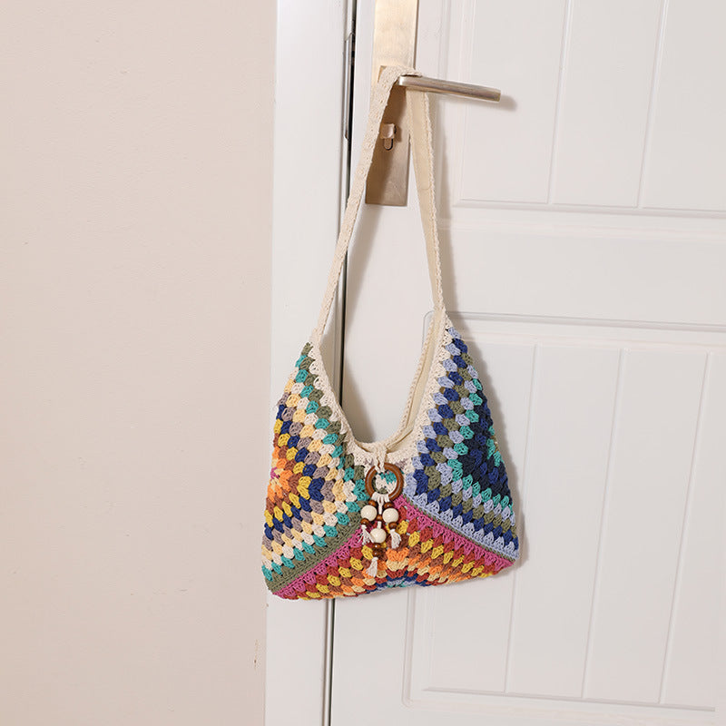 Damen Handtasche mit kunstvollem Flechtmuster Karnz