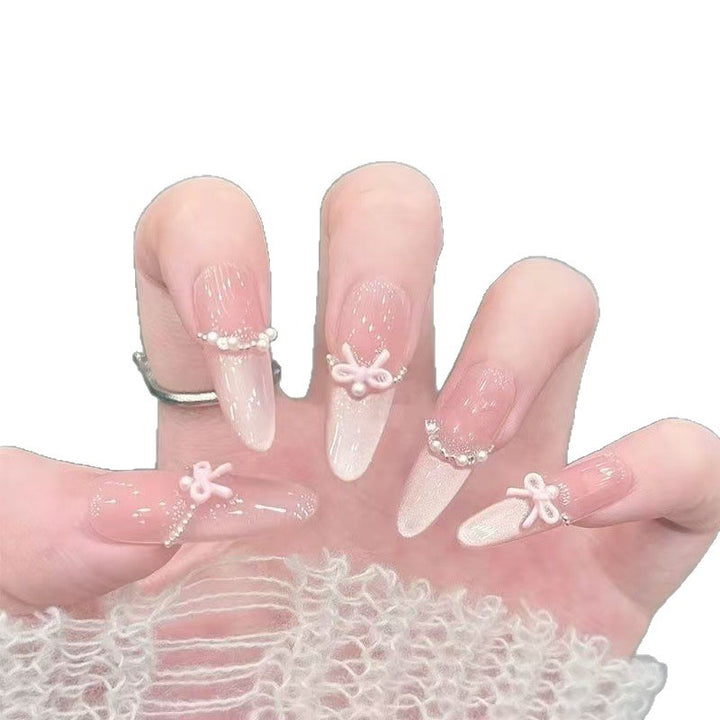 Elegante Stiletto Nagel Kunst Tipps mit Perlenakzenten