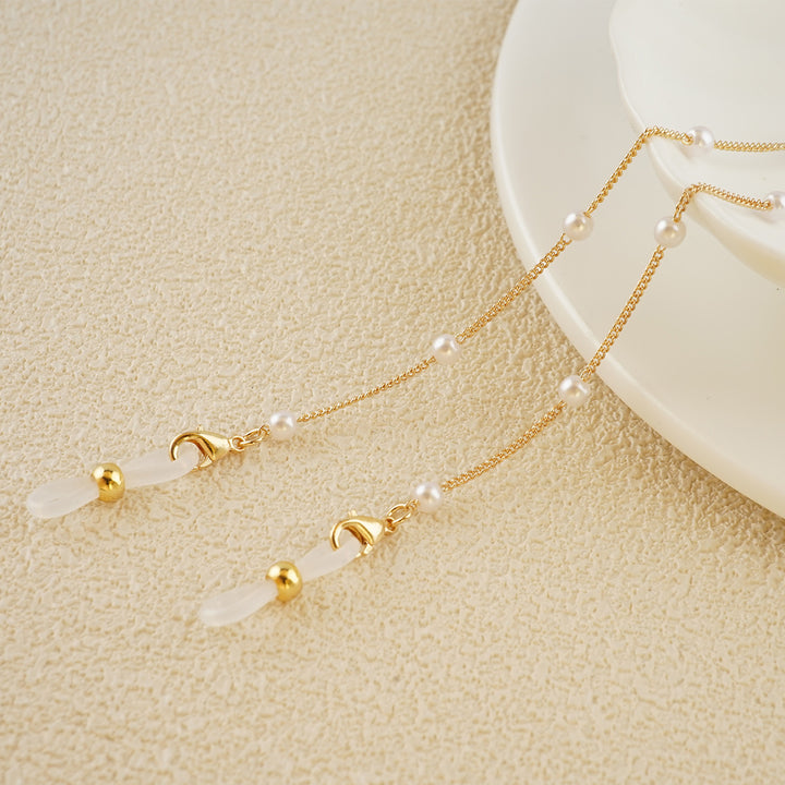 Eleganter mit Perlen verzierter Brillenhalter Karnz