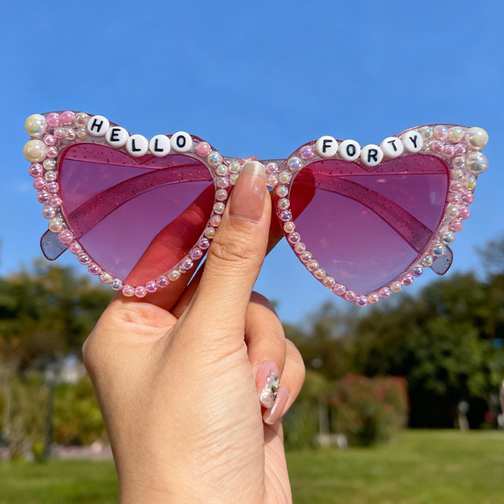 Perlenverzierte Cat-Eye-Sonnenbrille Karnz