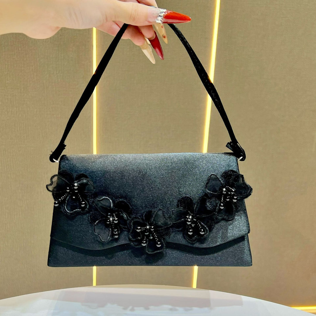 Blumenakzent Abendhandtasche